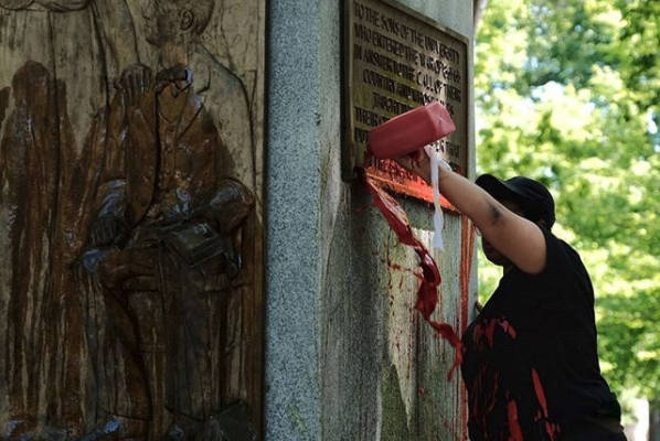 Red paint is poured on the statue called #silentsam at #uncchapelhill; a statue that celebrates a racist history in a public space unavoidable to students and community members who are threatened by it and the white supremacy it represents.