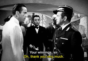 Casablanca screen capture: "Your winnings, sir." "Oh thank you very much."